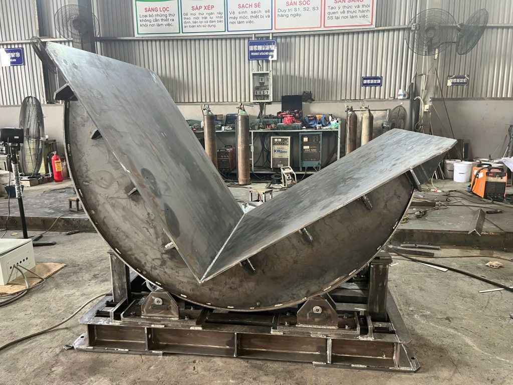 Máy lật khuôn